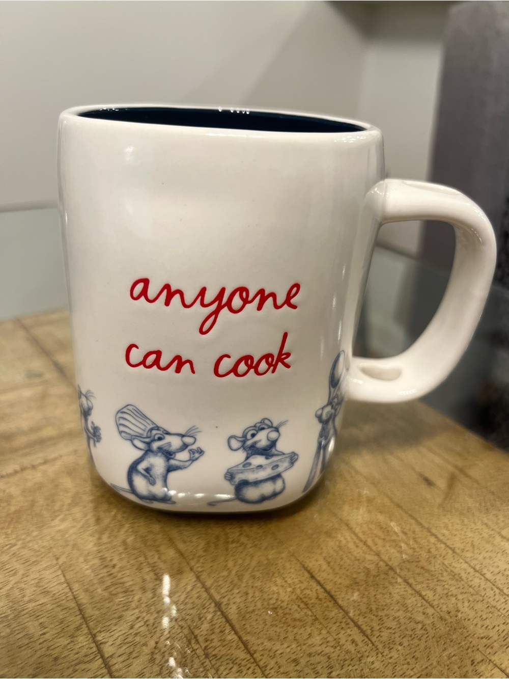 Rae Dunn "Anyone Can Cook" ceramic mug features Remy from Pixar's Ratatouille